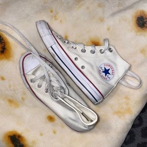 White Converse high top shoes